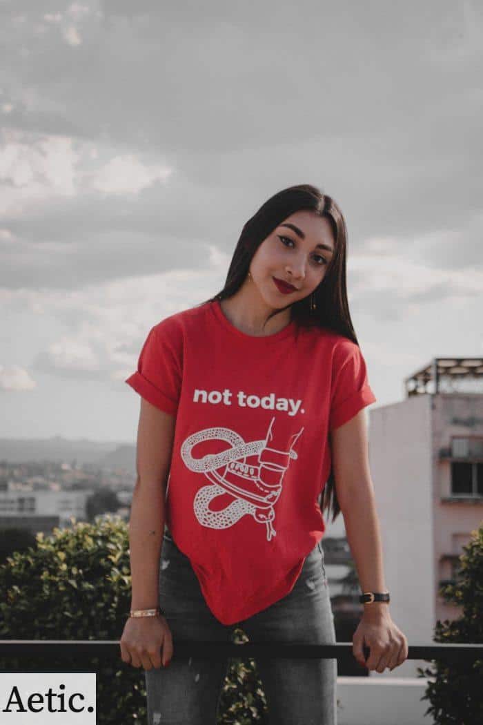 woman wearing red crew-neck with not today printed text