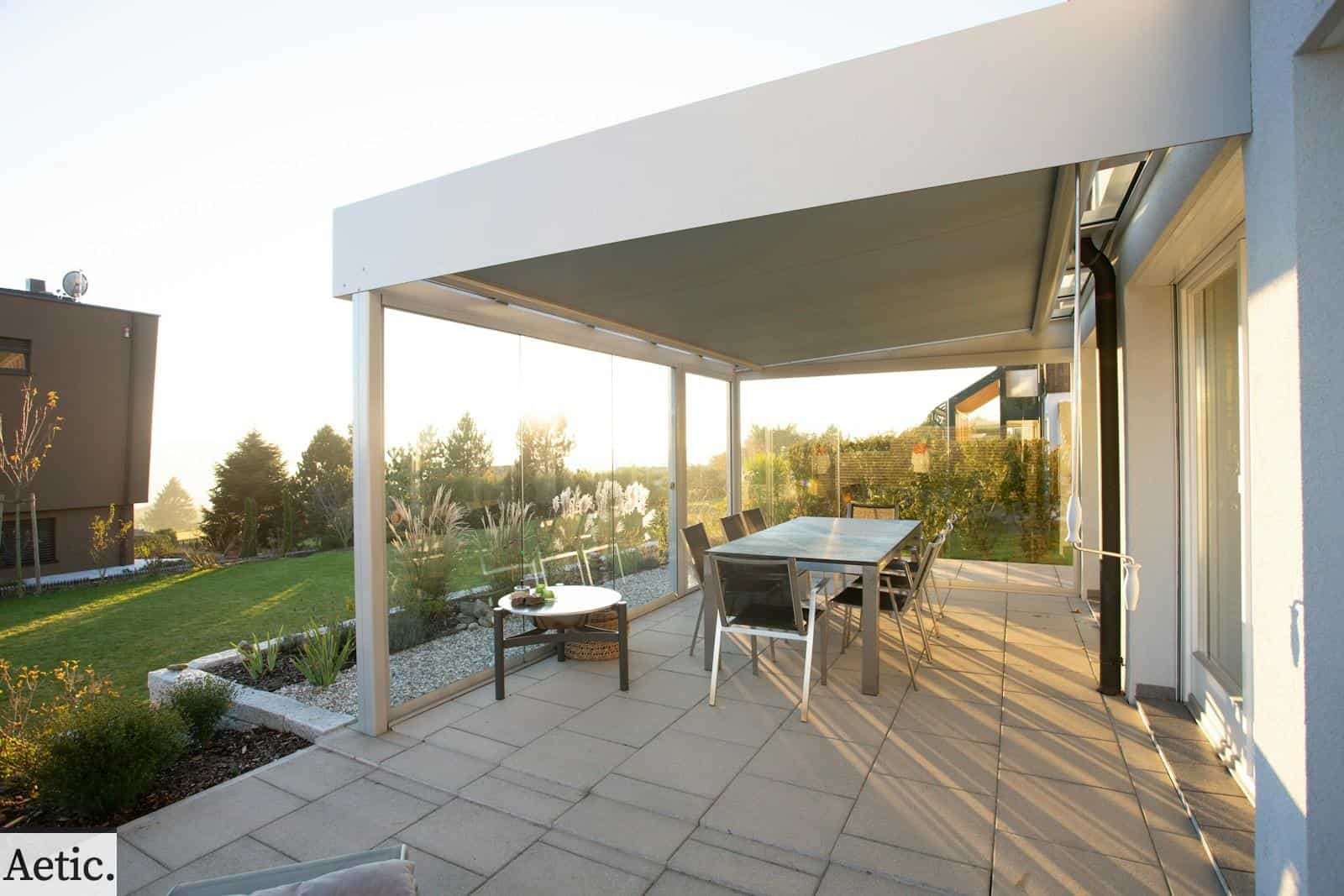black metal table and chairs on green grass field during daytime
