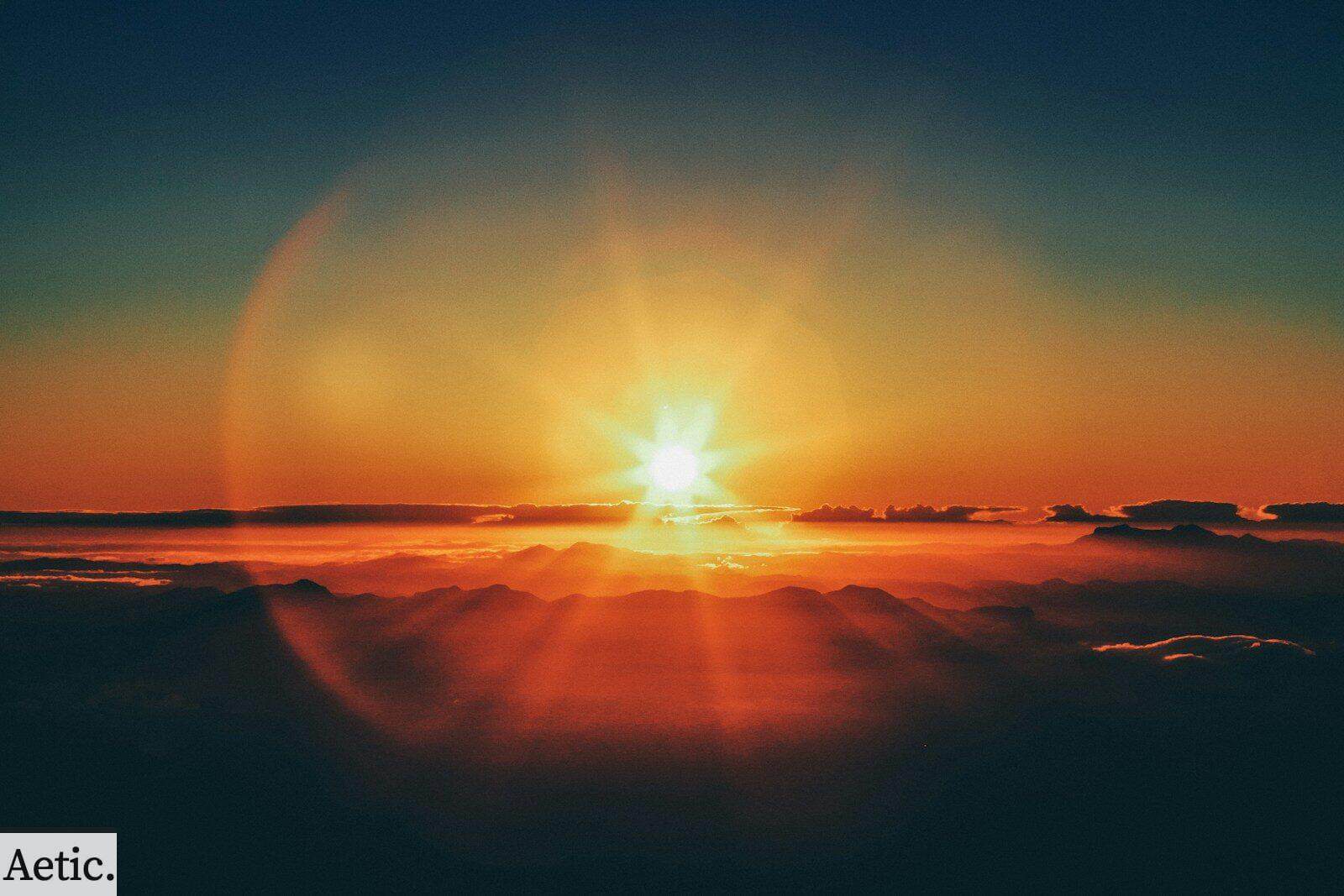 calm body of water during sunset