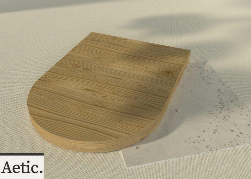 a wooden toilet seat on a white surface